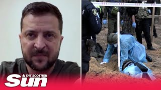 Hundreds of unmarked graves found in forrest at Izyum after Ukraine recaptured city from Russia
