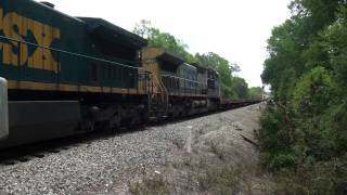 CSX manifest train stops to flag a messed up crossing.