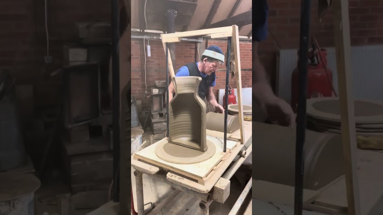 Gabriel cutting into a hedgehog house pot