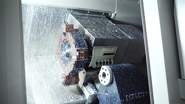 How does the turret coolant system work on the CNC slant-bed lathe machine？