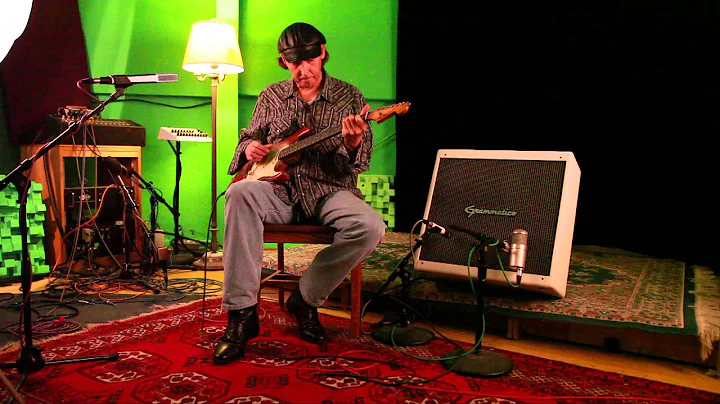 Alan Haynes plays SRV's 1960 red Strat through a G...