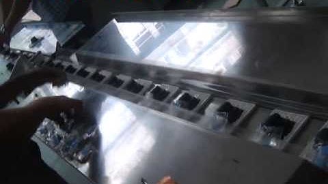 Foshan New Keli BOPP Film Switch Panel, TCL, Screws Down Paper Horizontal Packing Machine