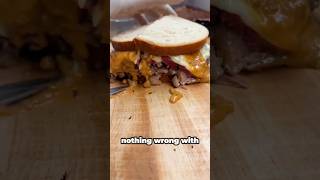 Sandwich Brisket, Pastrami, Russian Dressing, Melted Swiss Cheese and mustard at Katzsdeli!!