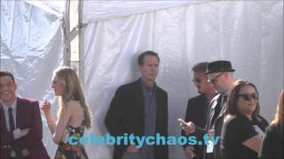 Famous Actor Sean Penn smoking a cigarette outside Independent Spirit Awards Wealth