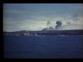 Iwo Jima shoreline under bombardment as seen from destroyer USS Gatling DD-671