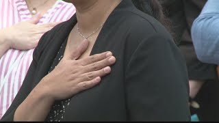 Newly naturalized citizens pledge allegiance to United States in Elkins