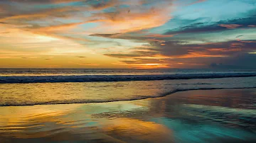 Gorgeous Pastel Sunset and Ocean Waves on a Tropical Beach