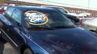 Oliver Signs Windshield Painting At J.d Byrider