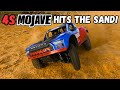 Arrma 4s mojave hits the sand oh and some evil traxxas xmaxxs