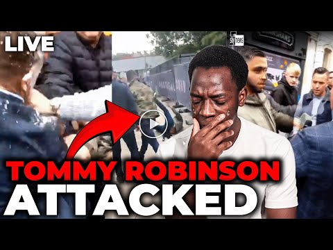 Tommy Robinson Is AMBUSHED And Attacked By Boxer Ty Mitchell Whilst Giving An Interview