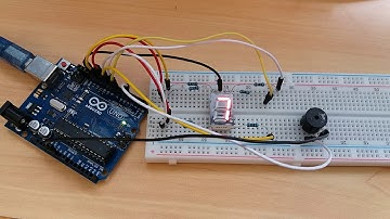 7 Segment Display + Buzzer (alarm when digit 5 appear)