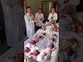 Doctors congratulate the old mother