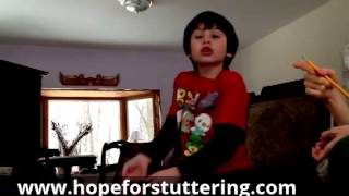School-age child shares about stuttering in session