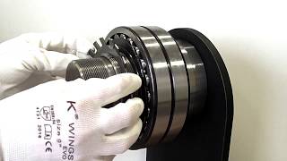 Dismounting spherical roller bearing with tapered bore from the adapter sleeve using hydraulic nut