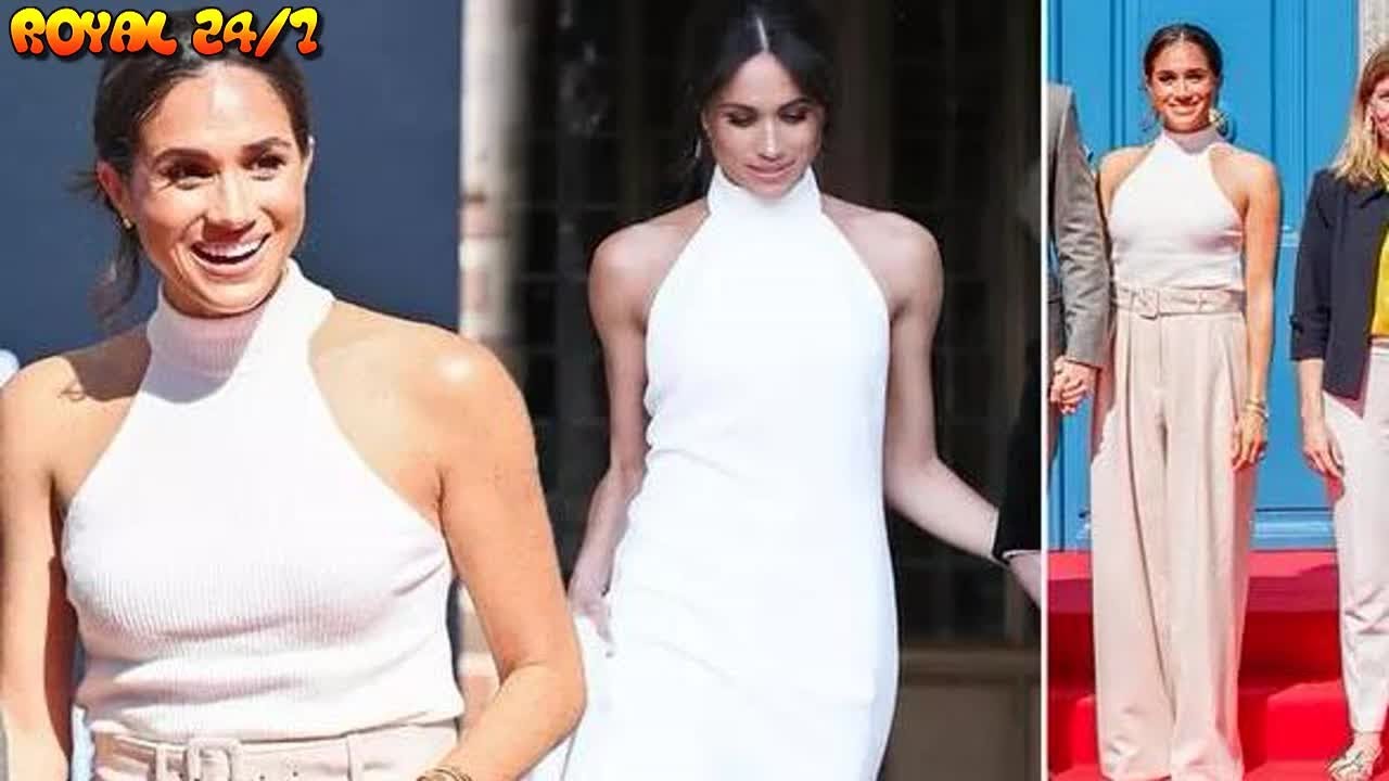 Meghan Markle mimics style of second wedding dress in white halter neck with Harry today Meghan Markle mimics style of second wedding dress in white halter neck with Harry today