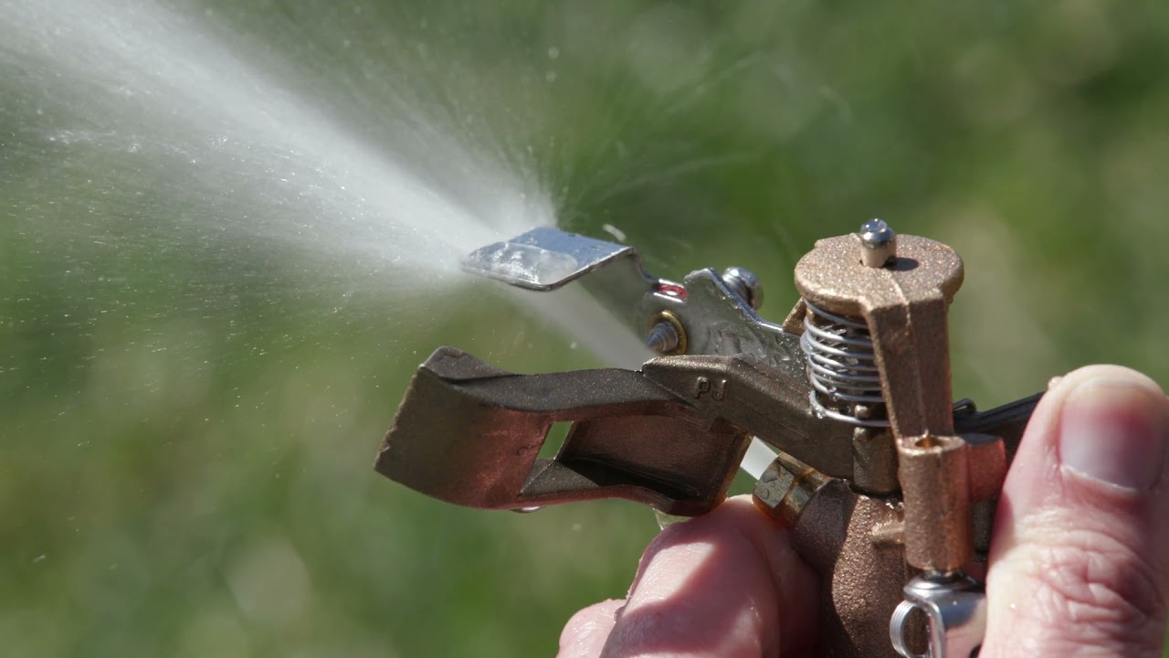 Adjusting and Maintaining a Rain Bird Riser-Mounted Brass Impact Sprinkler  