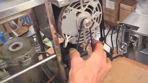Removing and replacing a drive belt on a Norwalk juicer