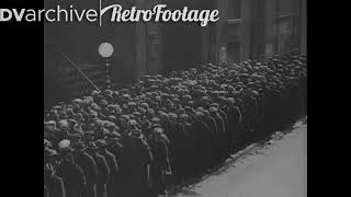 1929 - Men along a bread line in a city during the Great Depression.