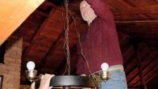 While dusting this wagon wheel lamp, it came loose from the top and crashed to the floor, A 10 foot drop. It has hung up there for 