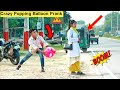 Crazy popping balloon prank on cute girl  popping balloons with public reaction  by  comical tv