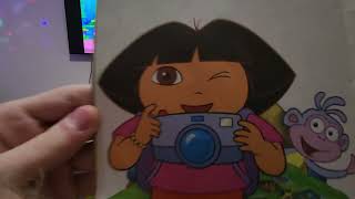 Benji reads and reviews Dora Say Cheese book
