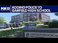 Debate on adding police to Garfield HS | FOX 13 Seattle