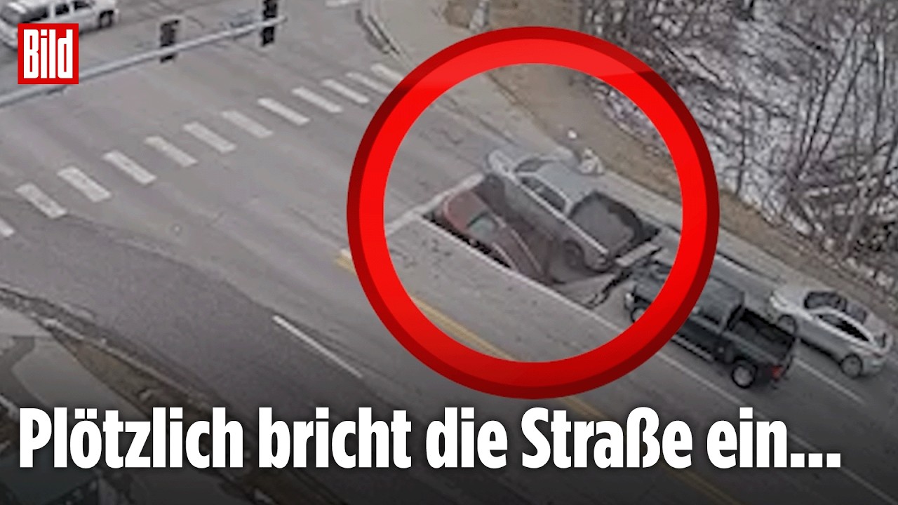 Omaha: Schock-Moment auf öffener Straße, als ein Erdloch zwei Autos verschluckt