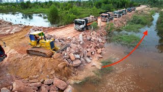 Fantastic Operator Huge Land Reclamation Process Bulldozer Pushing Rock Stone, Dump Truck unloaded