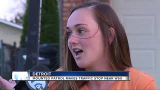 Mounted Wayne State University police officer pulls over driver in viral video