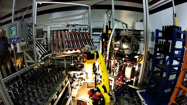 Automated Press Assembly Machine with Robotic Transfer for Geared Shafts - Compass Automation