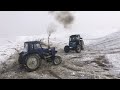 Трактор New Holland против Трактор Беларусь мтз 82