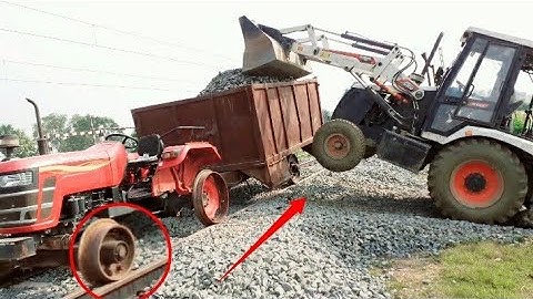 Mahindra Yuvo Tractor Pulling Fully Loaded Trolley On Railway Track | Jcb Machine Stunt