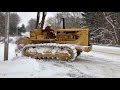 Caterpillar D8H Snow Mobile jumping..sort of