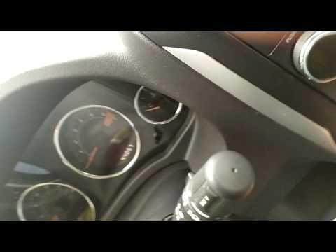 Видео: Как нулирате лампата за масло на Jeep Compass от 2010 г.?
