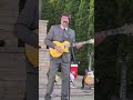 The Britins playing - Walk to End Alzheimer's custom made electric guitar