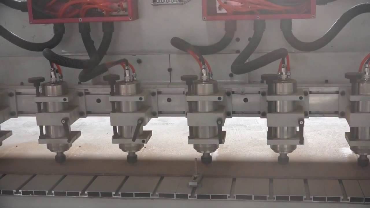 3 axis Multi spindles cnc machine working video - YouTube