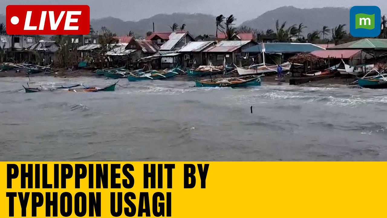 Mass evacuations as Typhoon Usagi hits Philippines - YouTube