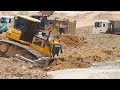 Wonderful Machines Large Capacity Dozer Slide Clearing Into The Mud Skills Operator Power Shantui