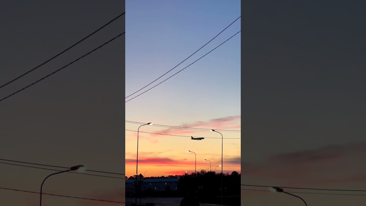 In this video you will see an airplane flying against the backdrop of a beautiful sunset,shorts