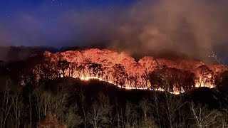 Crews continue to battle forest fire