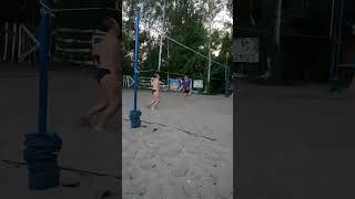 Beach volleyball, strong all-out strike.
