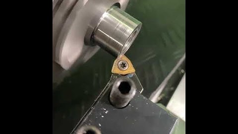 Turning operation on lathe machine with continuous chips