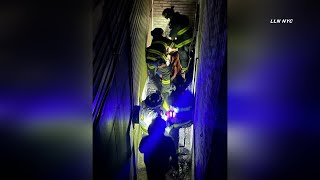 FDNY Rescues Man Stuck Between 2 Buildings