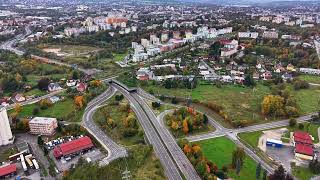 urban bridge scenery, autumn city overpass view, drone captures suburban highway intersection in