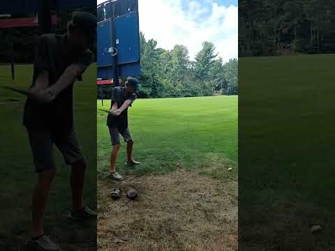 Golfer loses balance after powerful swing in Muskegon, Michigan, USA