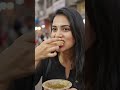 Girl eating pani poori bazaar