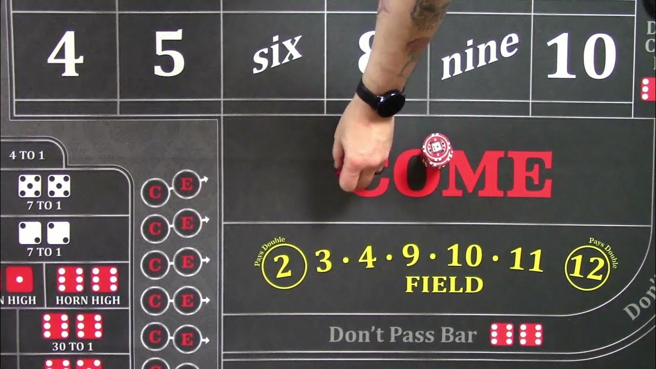What is and isn't a roll in craps, and how cocked dice are handled
