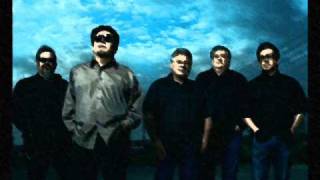 Video thumbnail of "Los Lobos - Saint Behind The Glass"