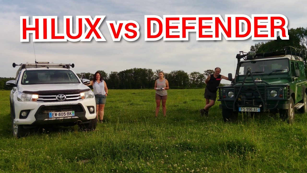LAND ROVER DEFENDER VS TOYOTA HILUX - YouTube