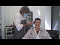 Woman experiences smooth head shaving at the barbershop. [Trailer]